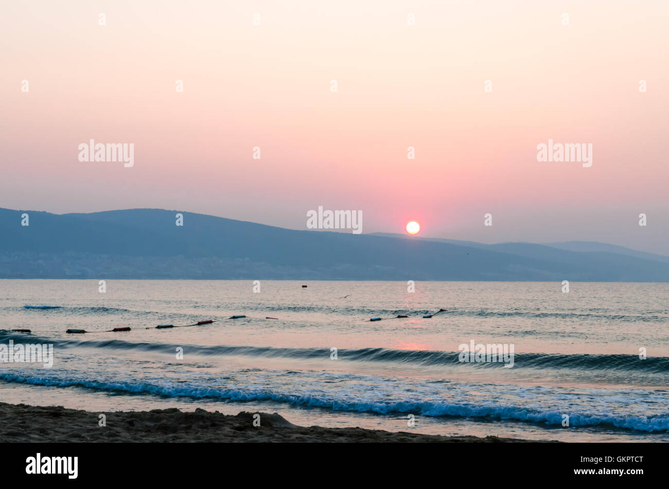 Lever de soleil sur la plage Banque D'Images