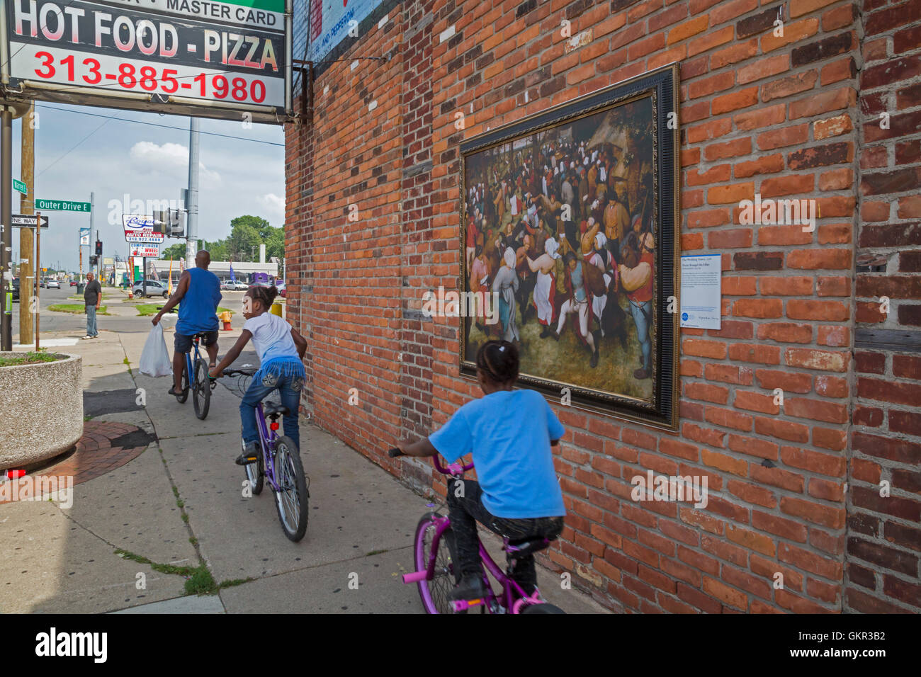 Detroit, Michigan - Reproduction de la danse de mariage, une peinture de 1566 par Pieter Bruegel l'ancien sur le mur d'une pizza. Banque D'Images