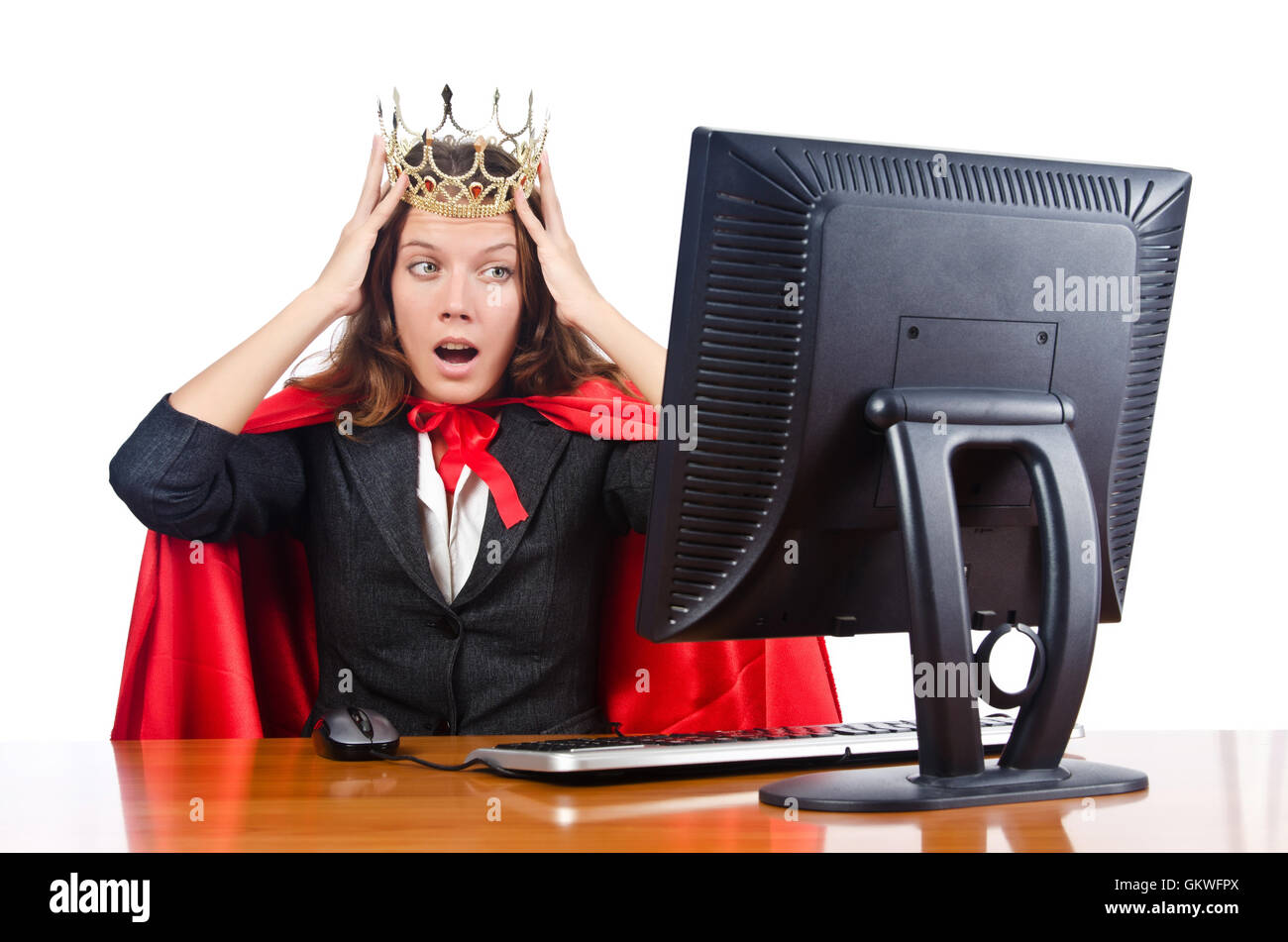 Superwoman travailleur avec couronne working in office Banque D'Images