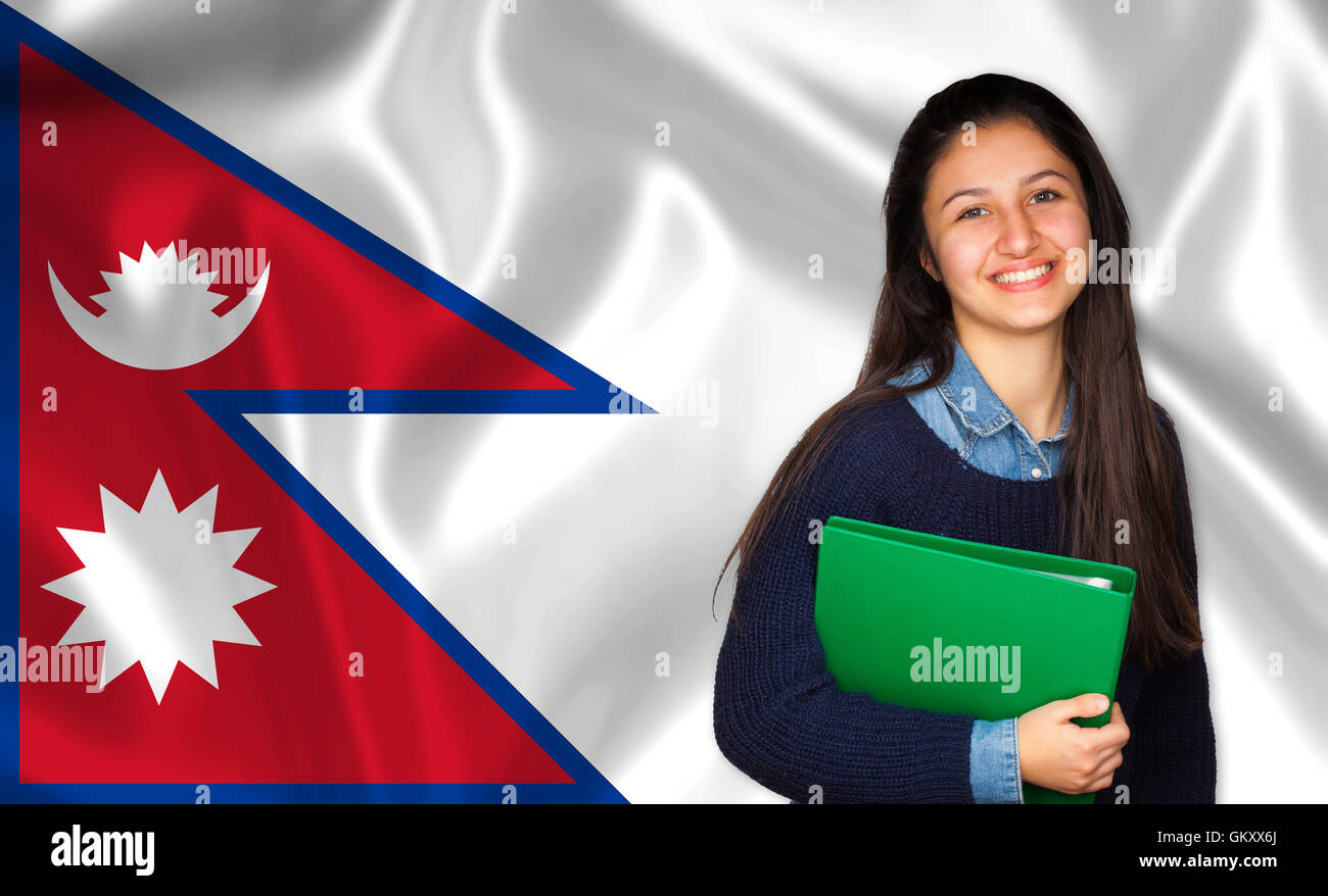 Teen student smiling sur drapeau népalais. Concept d'enseignements et l'apprentissage des langues étrangères. Banque D'Images