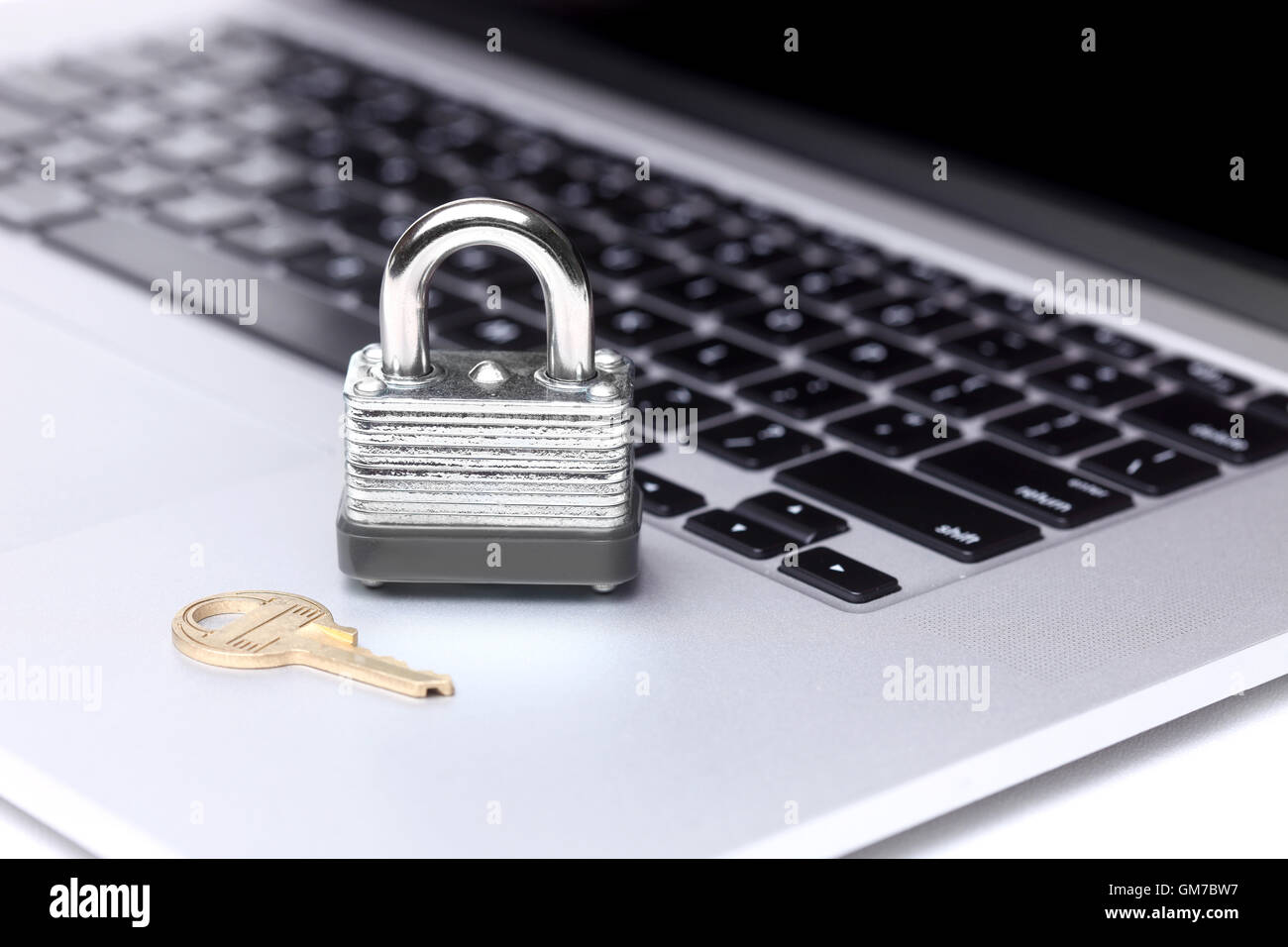 Ordinateur avec serrure et clé Banque D'Images