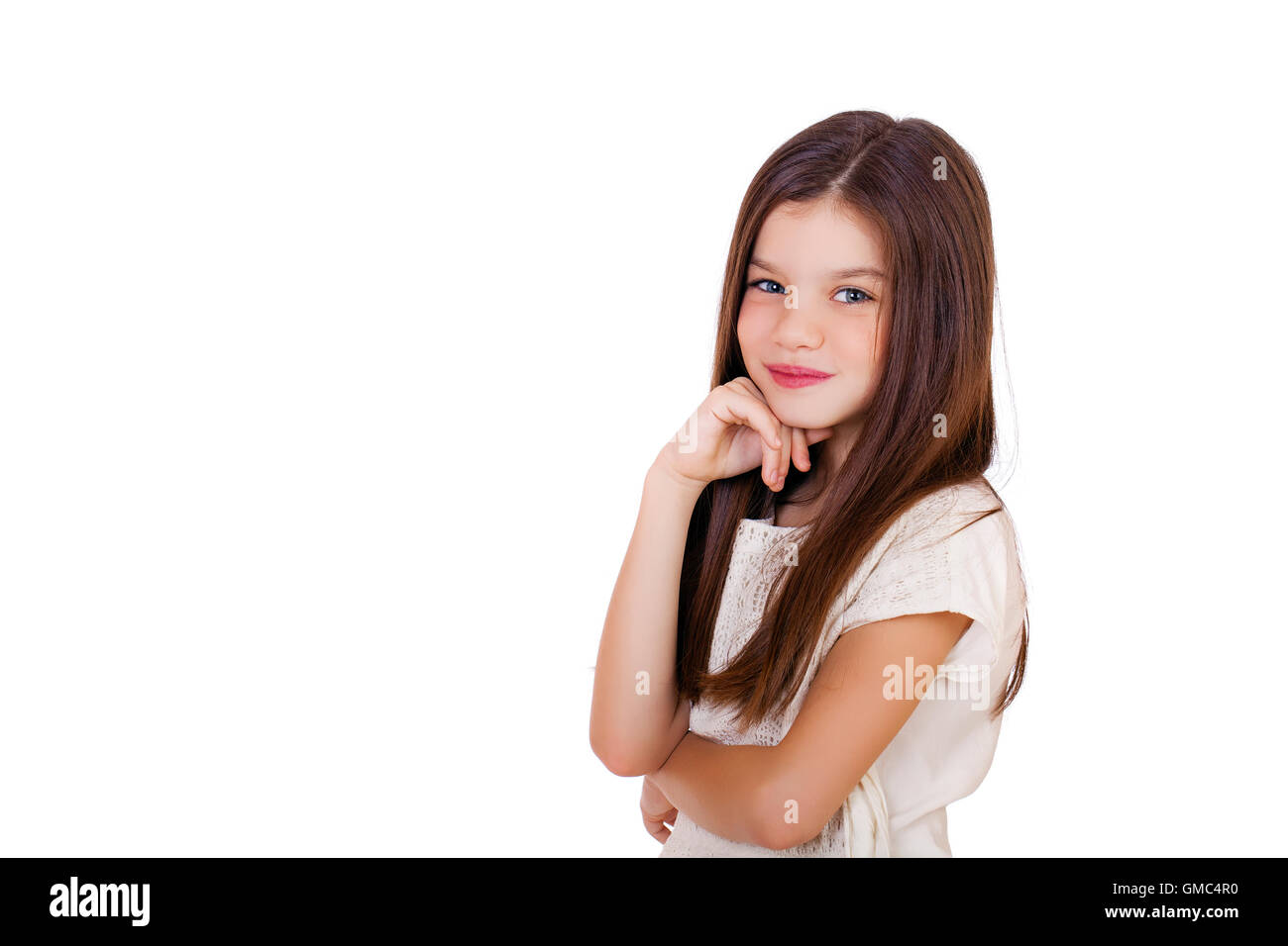 Portrait d'une charmante petite fille, isolé sur fond blanc Banque D'Images