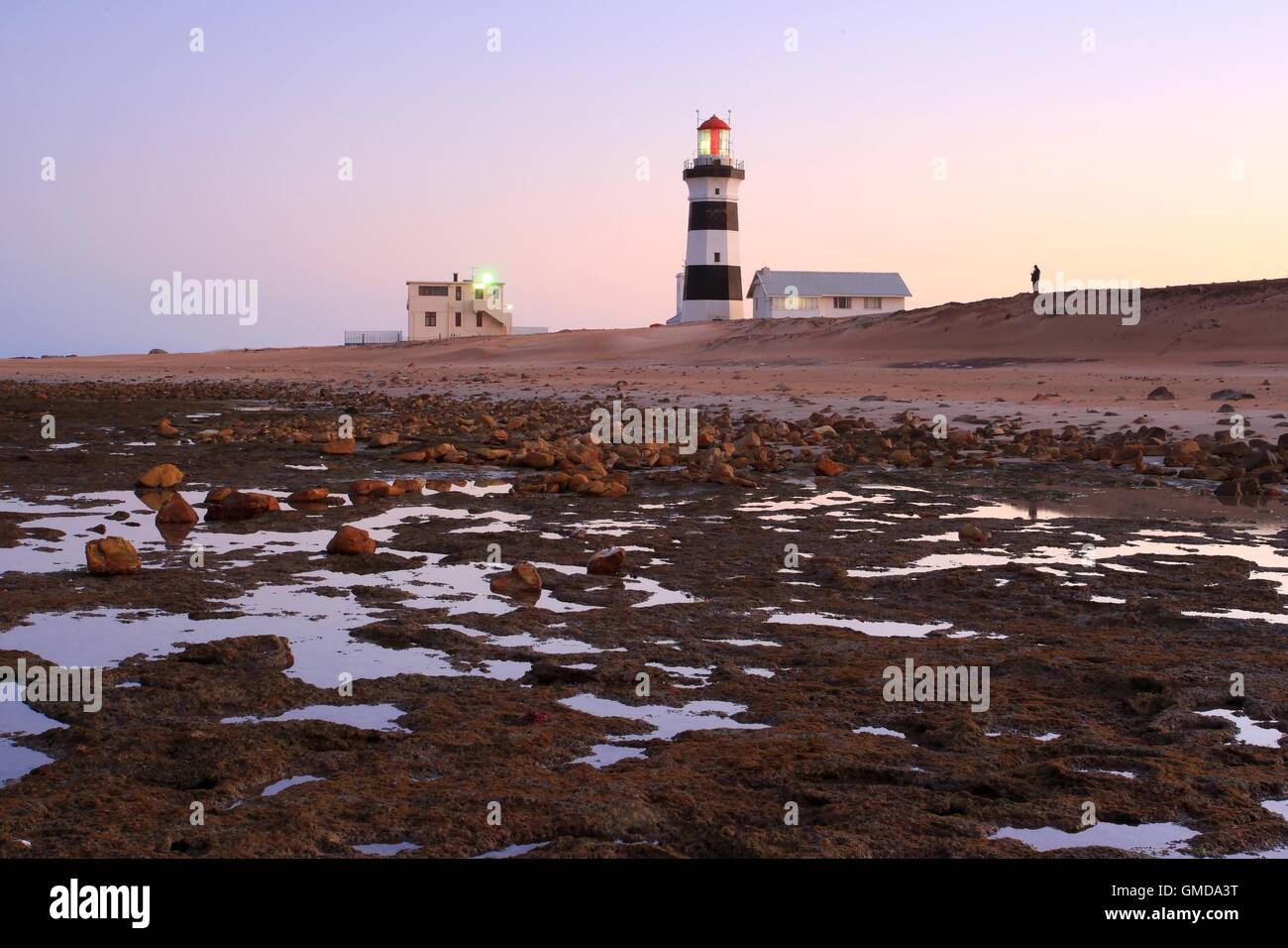 Phare au coucher du soleil Banque D'Images