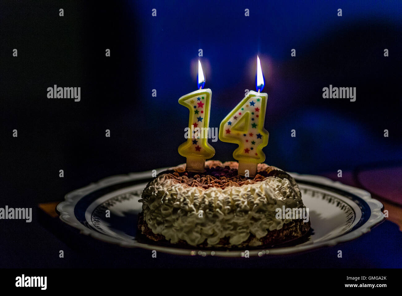 Gateau Au Chocolat Et Creme Avec Le Numero Un Et Numero Quatre Bougies Pour Celebrer 14 Ans Anniversaire En Arriere Plan Flou Photo Stock Alamy Gateau Au Chocolat Et Creme Avec Le Numero Un Et Numero Quatre Bougies Pour Celebrer 14 Ans Anniversaire En Arriere Plan Flou Photo Stock Alamy