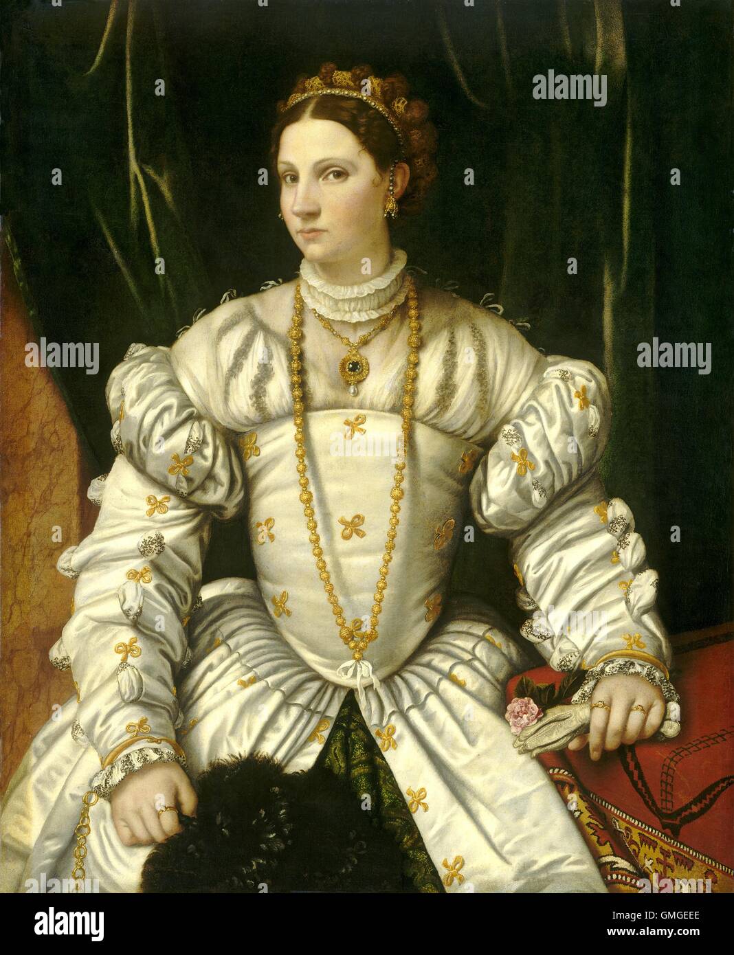 Portrait de femme en blanc, par Moretto da Brescia, 1540, la peinture italienne de la Renaissance, de l'huile sur toile. Habillé richement et bejeweled les femmes de la province de Vénétie. Couvrant le tableau de droite est un 'bosque carpet', une amende de tapis turc avec un BSLOC 2016 desig ( 6 136) Banque D'Images