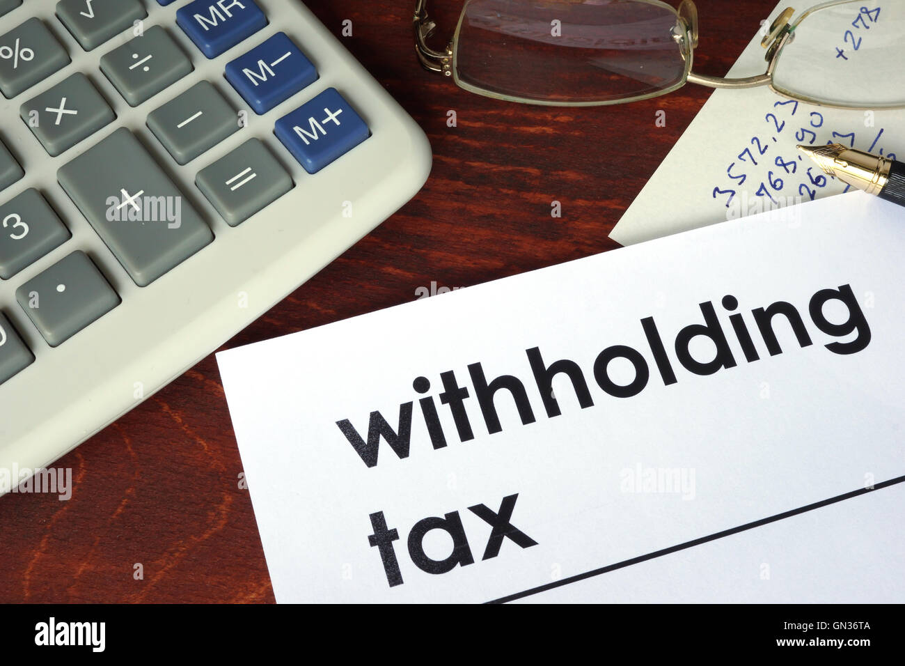 La retenue à écrit sur un papier. Concept financier. Banque D'Images