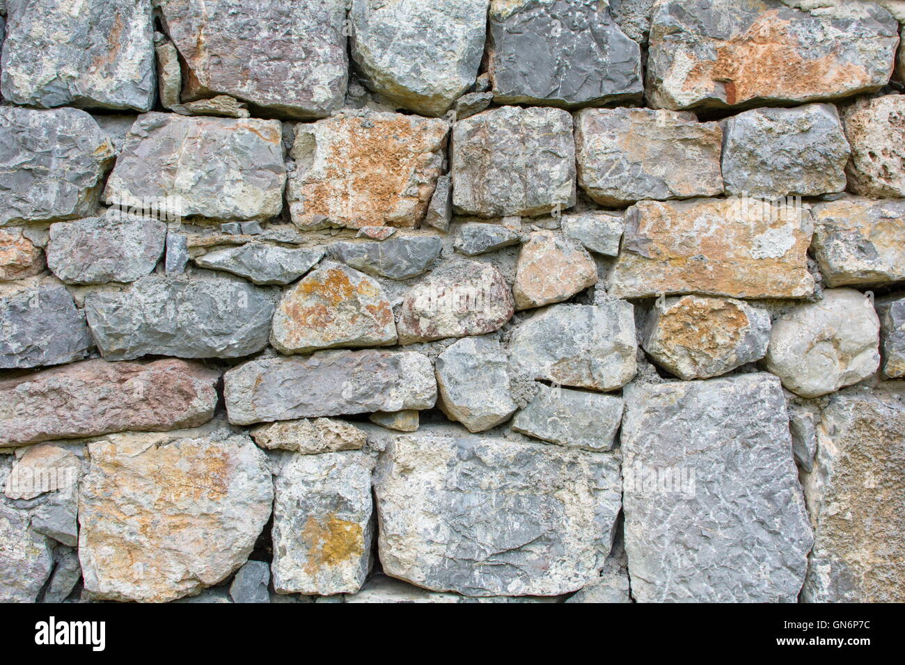 Vieux Mur traditionnel fait de pierres historique Banque D'Images