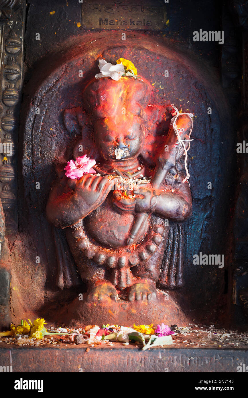 Détail de la statue représentant Mahakala, Temple d'or, Patan, Népal Banque D'Images
