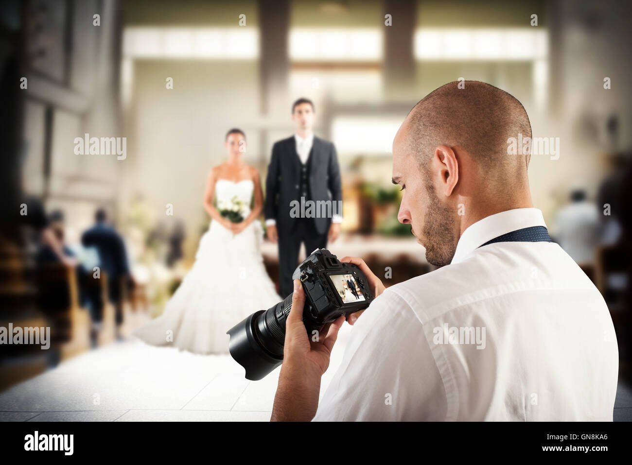 Photographe professionnel dans un mariage Banque D'Images