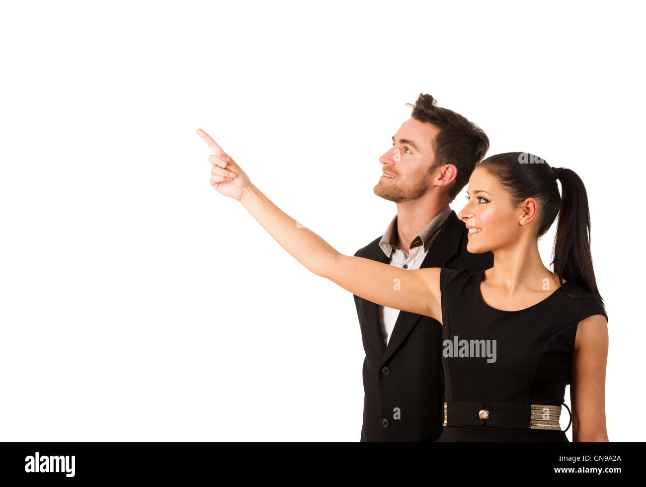 Business Woman à côté de l'autre, en pointant avec le doigt à un brillant avenir. Image conceptuelle. Banque D'Images