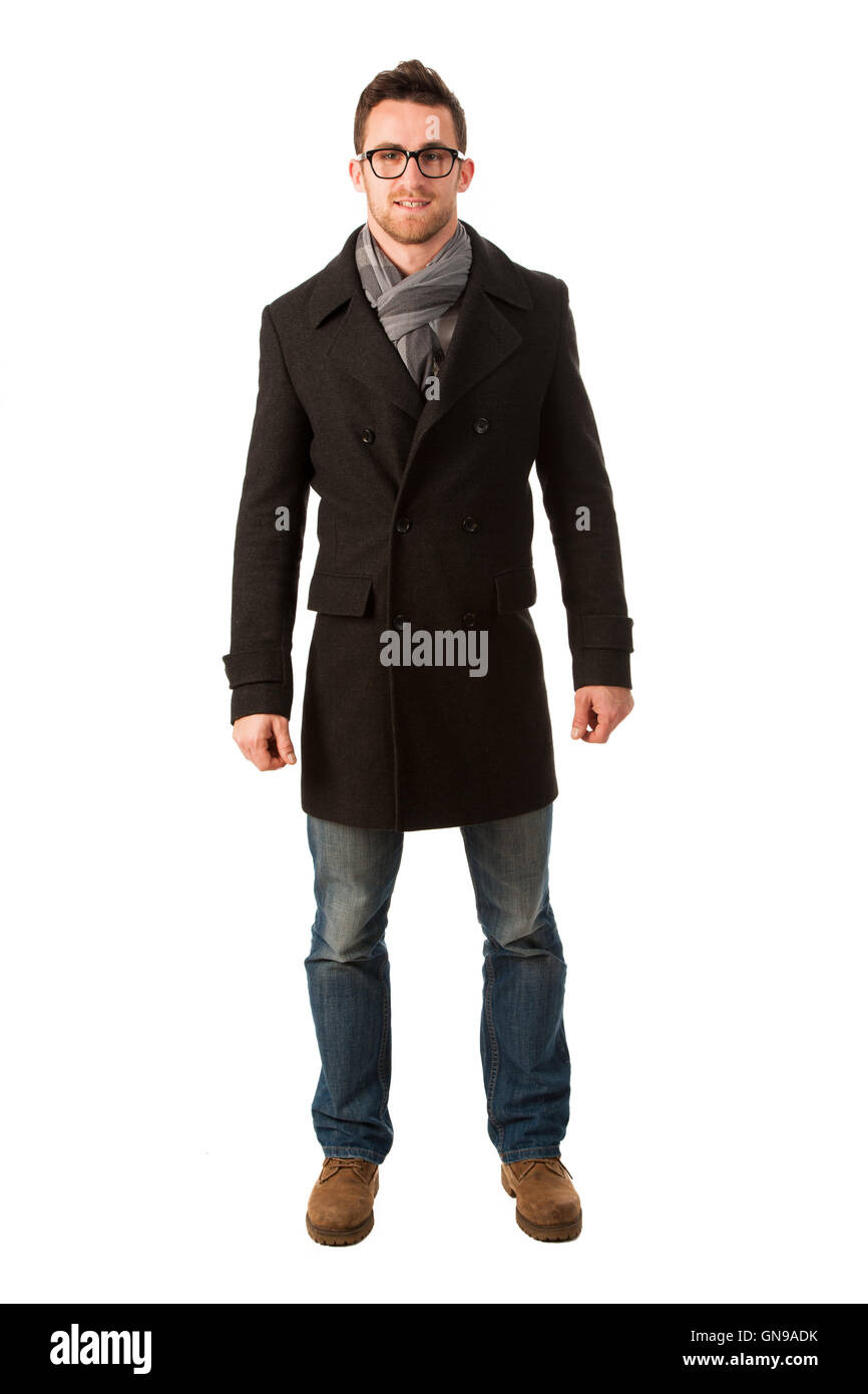 Homme confiant debout en hiver coat smiling. Smart casual dressed man. Banque D'Images