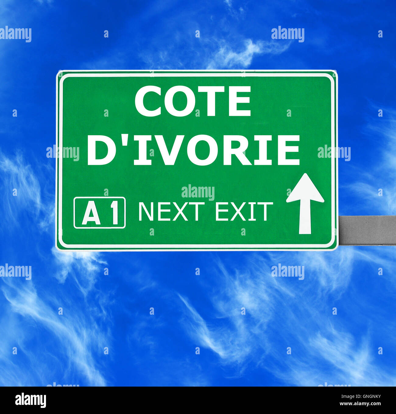 COTE D'IVOIRE road sign against clear blue sky Banque D'Images