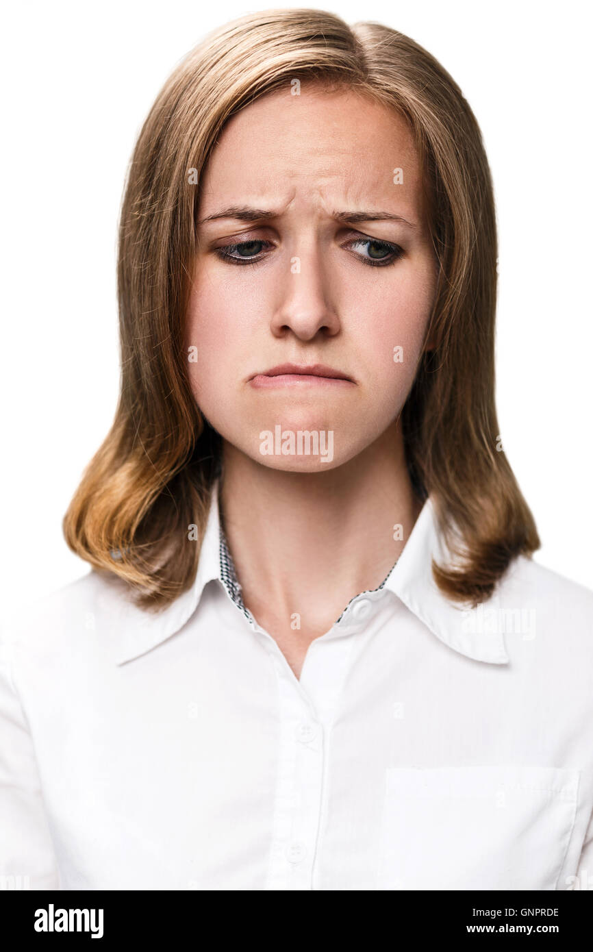 Jeune femme faisant la moue expression isolé sur fond blanc Banque D'Images