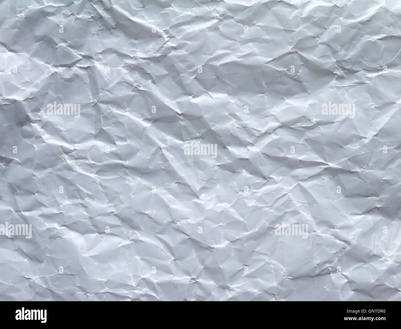 Feuille de papier ciré froissé blanc arrière-plan gros plan Banque D'Images