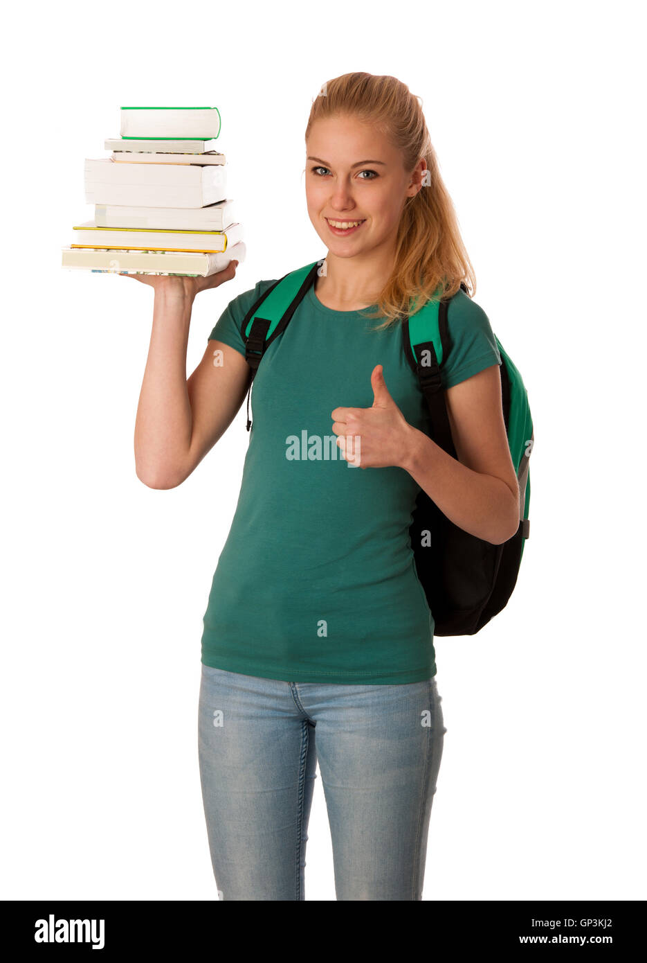 Étudiante blonde avec pile de livres sur la main et sac à dos gesturing ok signe, heureux d'acquérir des connaissances et apprendre de nouvelles choses. Banque D'Images