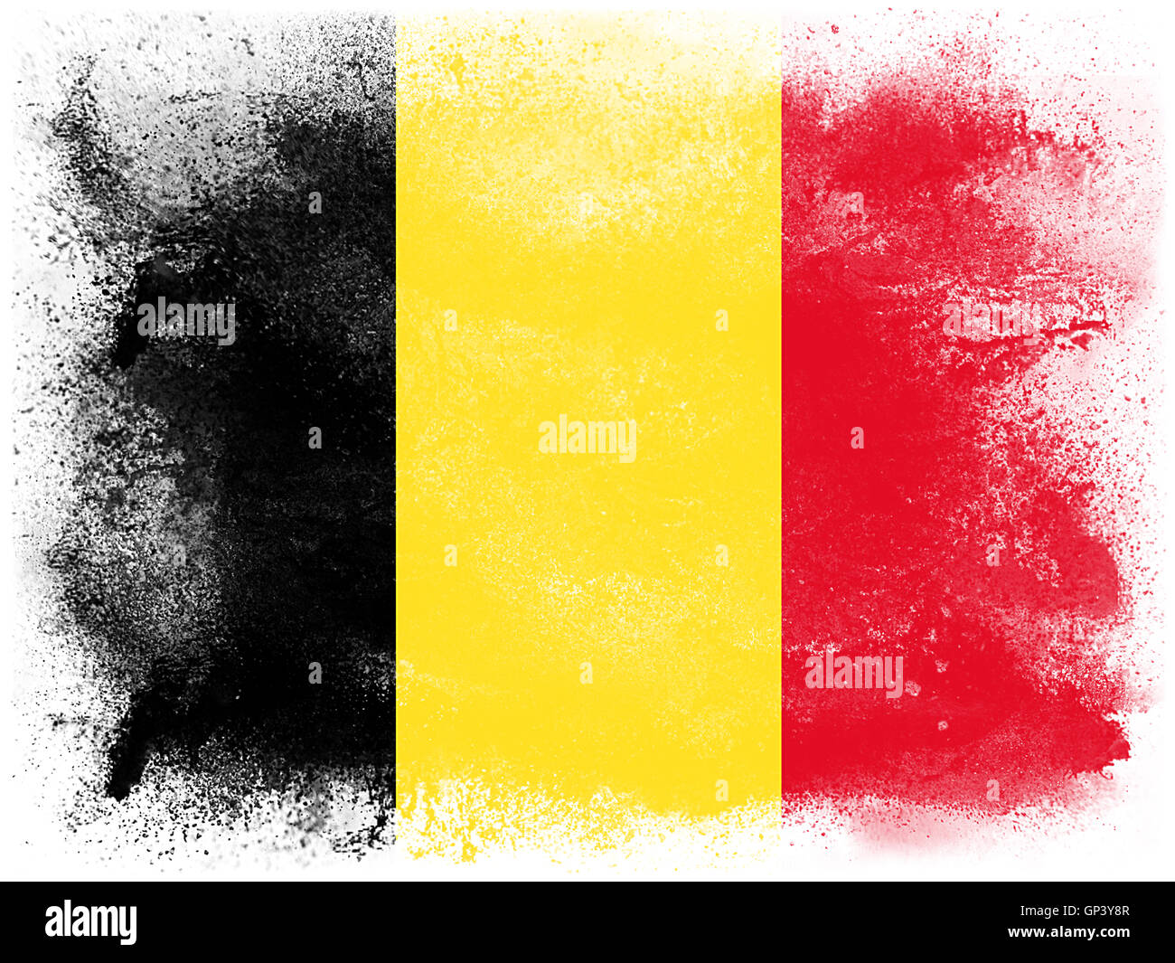 Explosion de peinture en poudre en couleurs de Belgique pavillon isolé sur fond blanc. Résumé de l'explosion des particules de poussière colorée. Banque D'Images