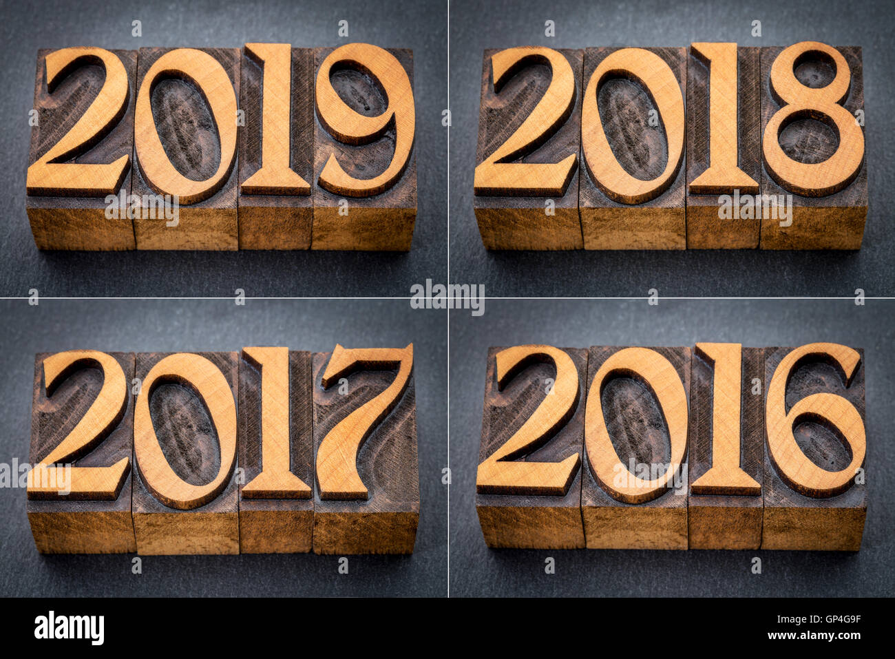 2016, 2017, 2018 et 2019 de l'année - texte en typo bois type contre l'ardoise gris Banque D'Images