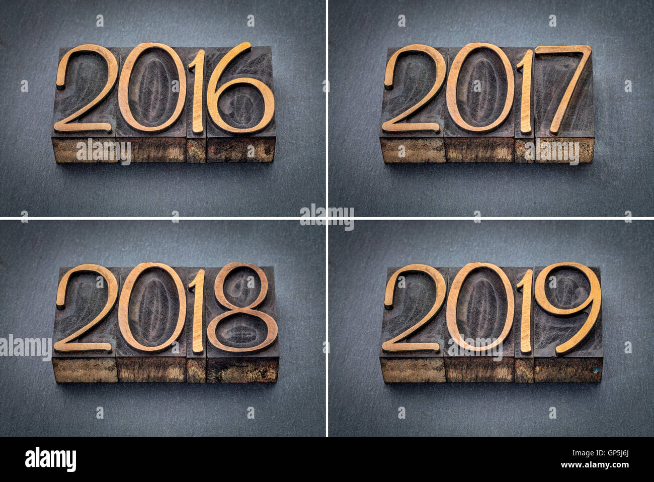 Année 2016, 2017, 2018 et 2019 set - texte en typo bois type contre l'ardoise gris Banque D'Images