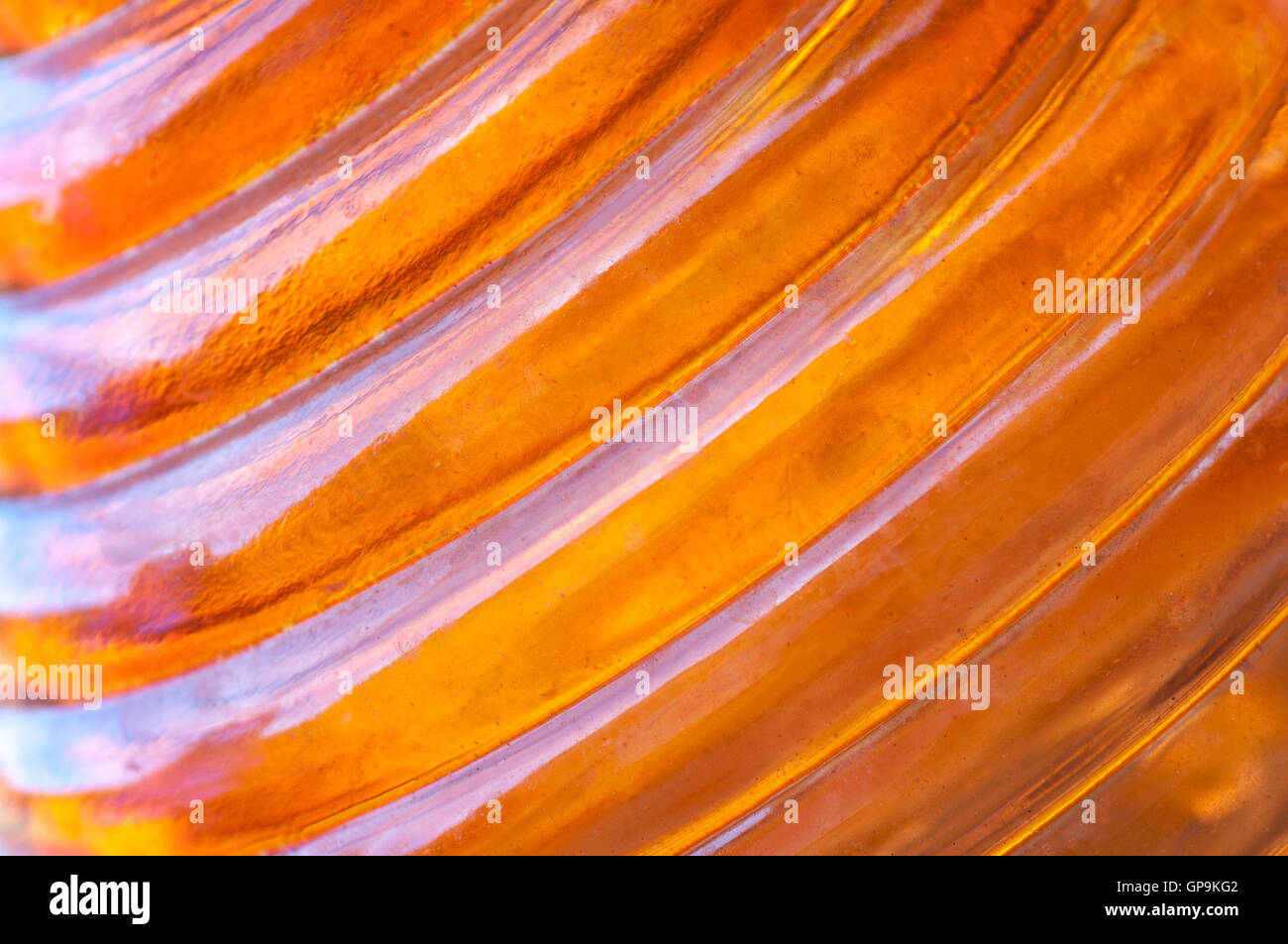 Fond de verre ambre orange striée. Banque D'Images