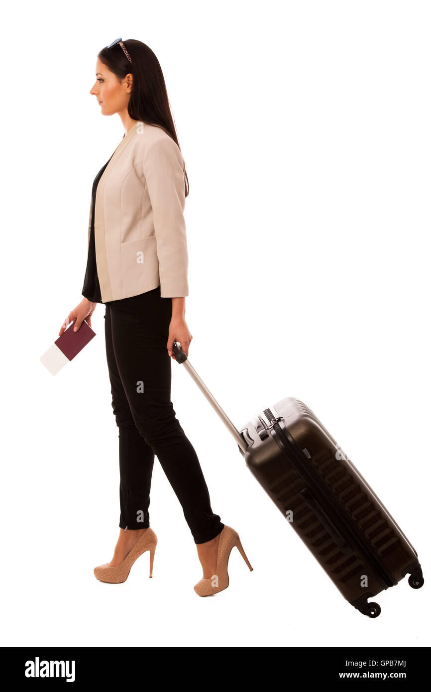 Femme avec valise partir en voyage d'affaires. Banque D'Images