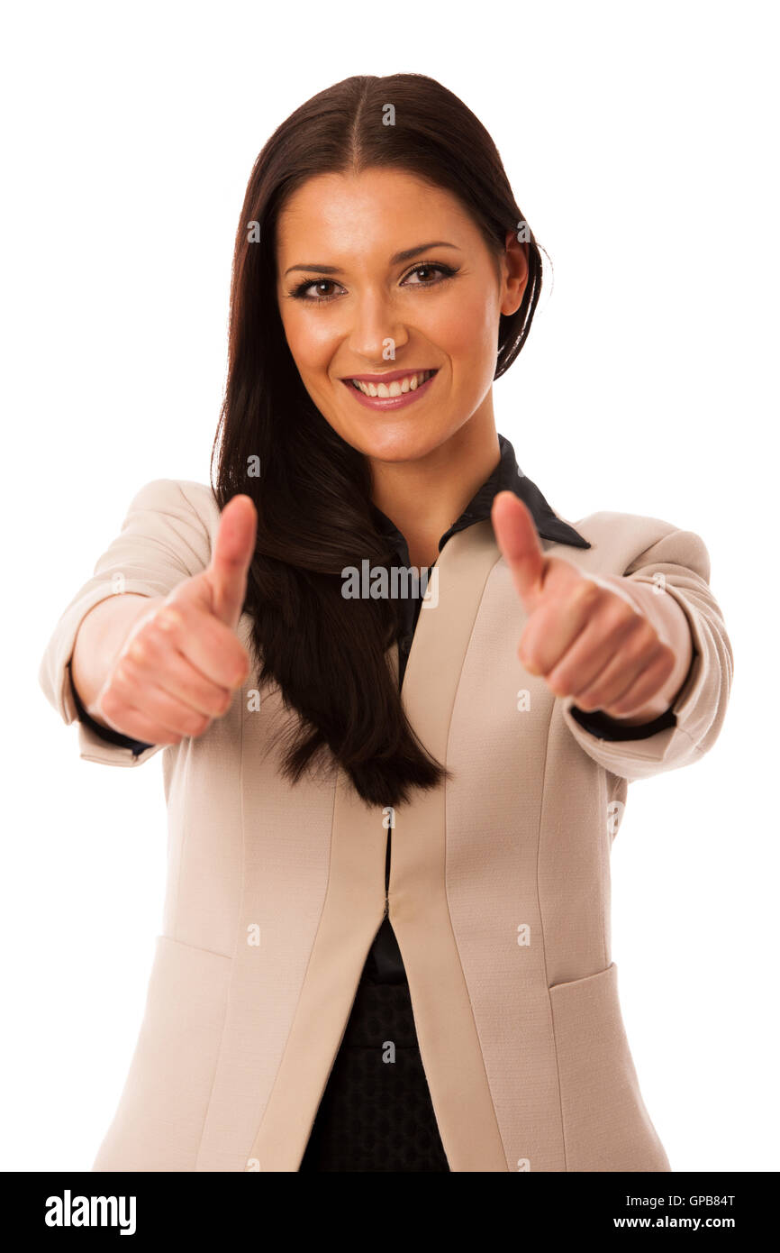 Woman gesturing Thumbs up avec succès et grand sourire heureux. Banque D'Images