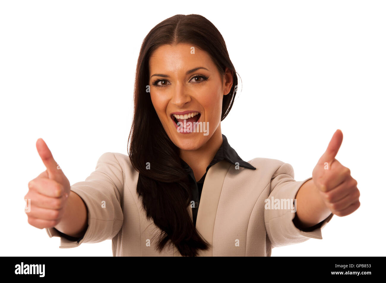 Woman gesturing Thumbs up avec succès et grand sourire heureux. Banque D'Images