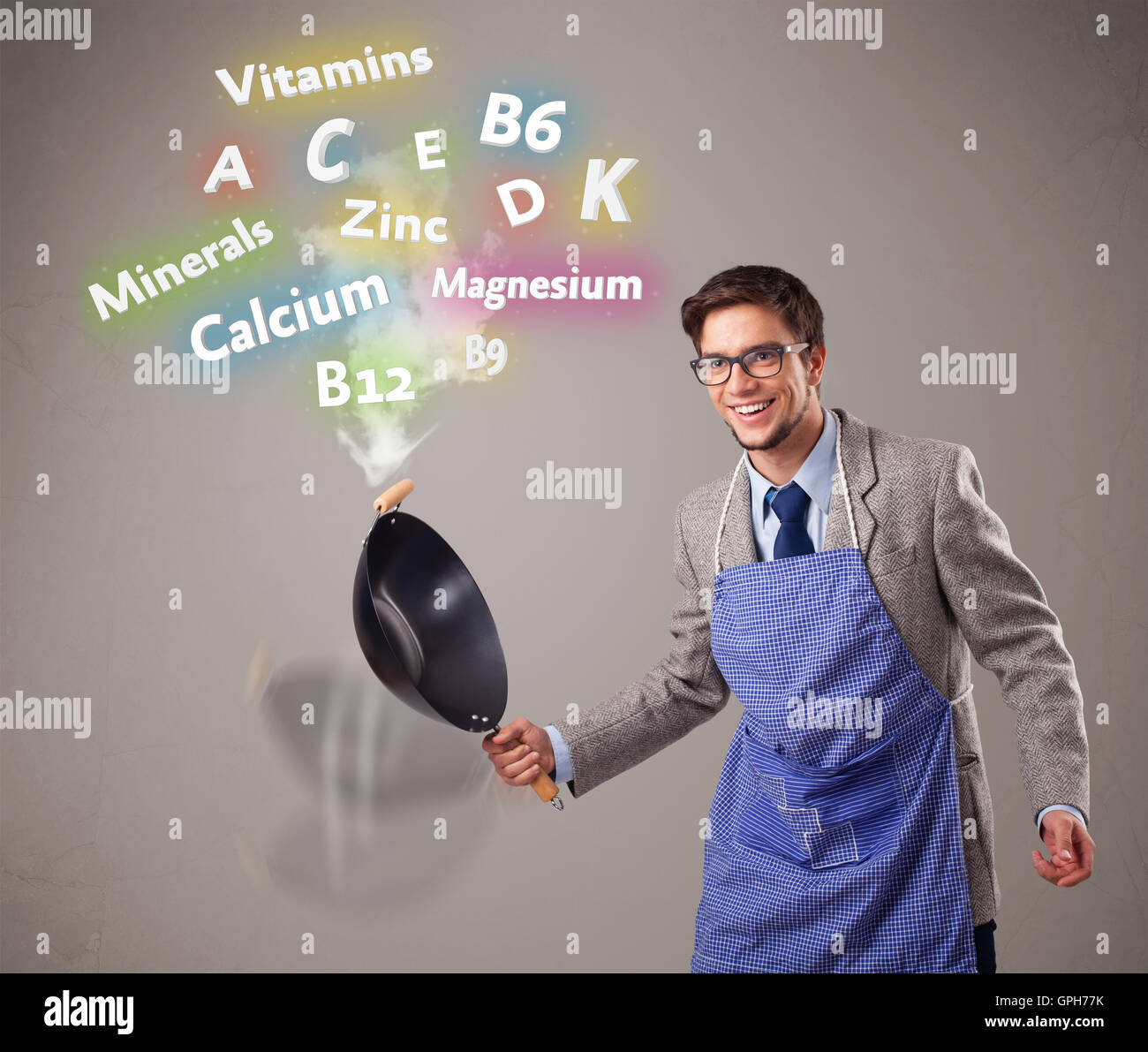 Man cooking vitamines et minéraux Banque D'Images