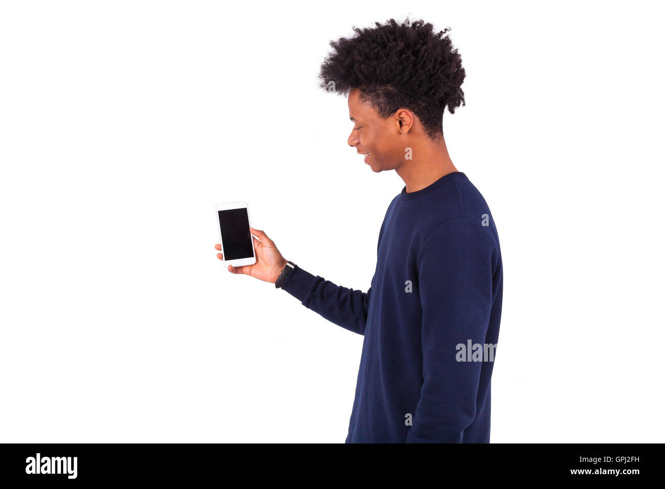 Young African American man showing his de l'écran du smartphone - adolescent noir personnes Banque D'Images