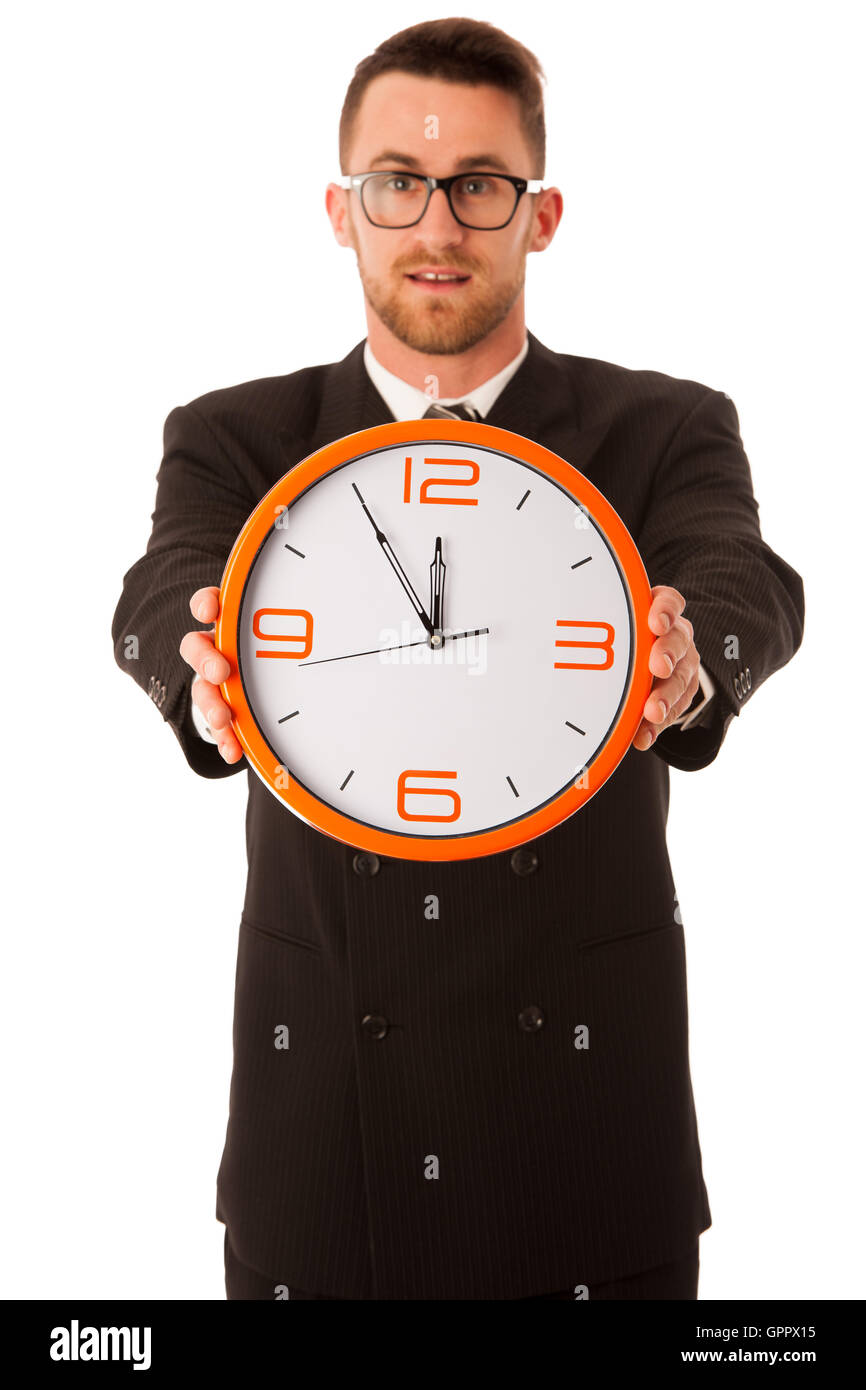 Homme d'affaires réussi en fonction de vérification formelle de temps sur wrist watch isolated over white. Banque D'Images