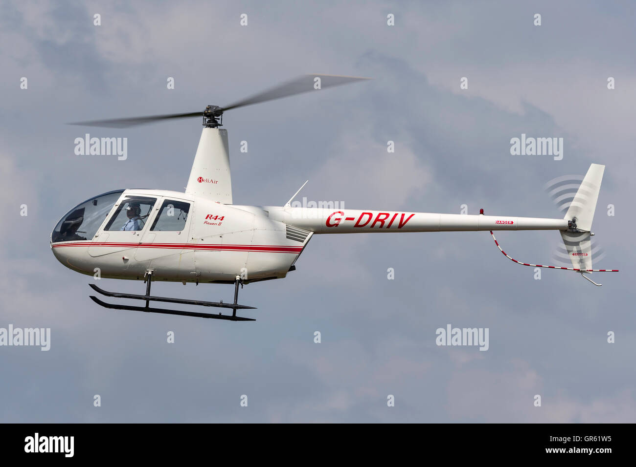 Hélicoptère Robinson R44 G-DRIV Banque D'Images