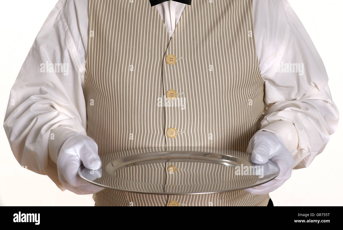 Butler avec un plateau d'argent Banque D'Images