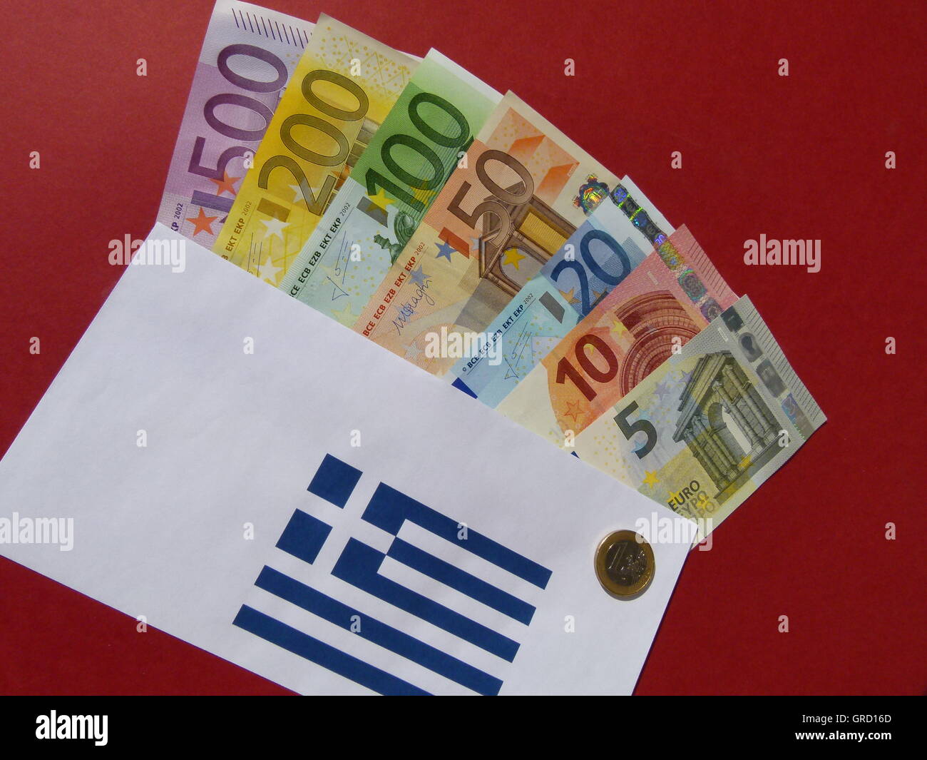 Symbole concernant l'aide à la Grèce, les billets dans une enveloppe Banque D'Images