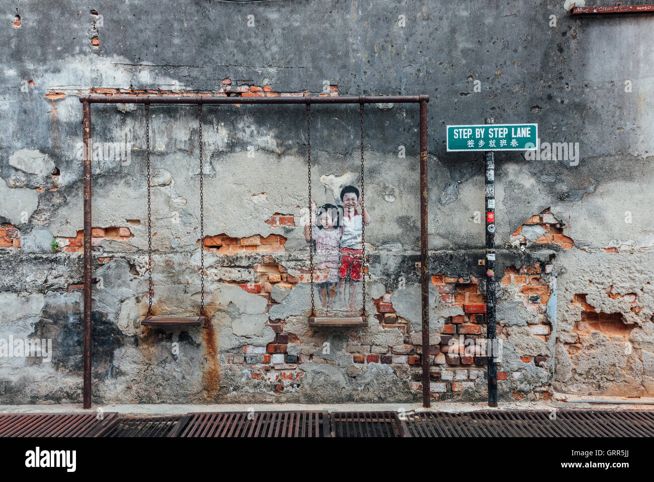 George Town, Malaisie - Mars 21, 2016 : Célèbre Penang street art créatif sur le mur de patrimoine de l'UNESCO Zone tampon. Banque D'Images