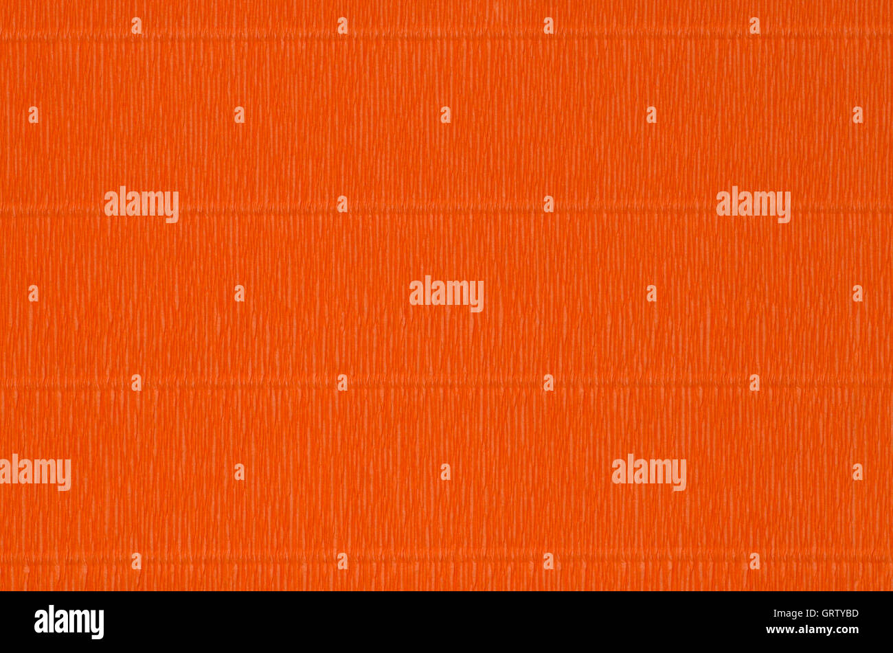 Papier crêpe couleur orange texture d'arrière-plan Banque D'Images