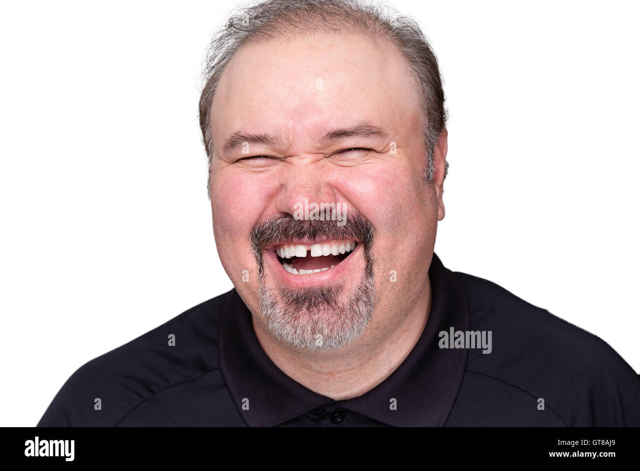 Homme d'âge moyen avec une barbiche beard bénéficiant d'un bon rire , Tête et épaules isolated on white Banque D'Images