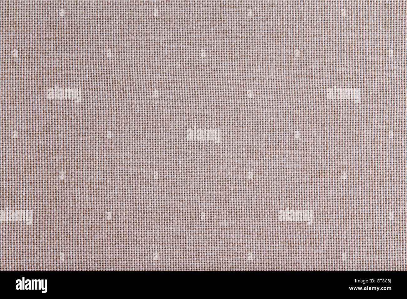La texture de fond tissé grossier tissu beige avec un tissu à mailles ouvertes de fibres naturelles dans une vue plein cadre Banque D'Images