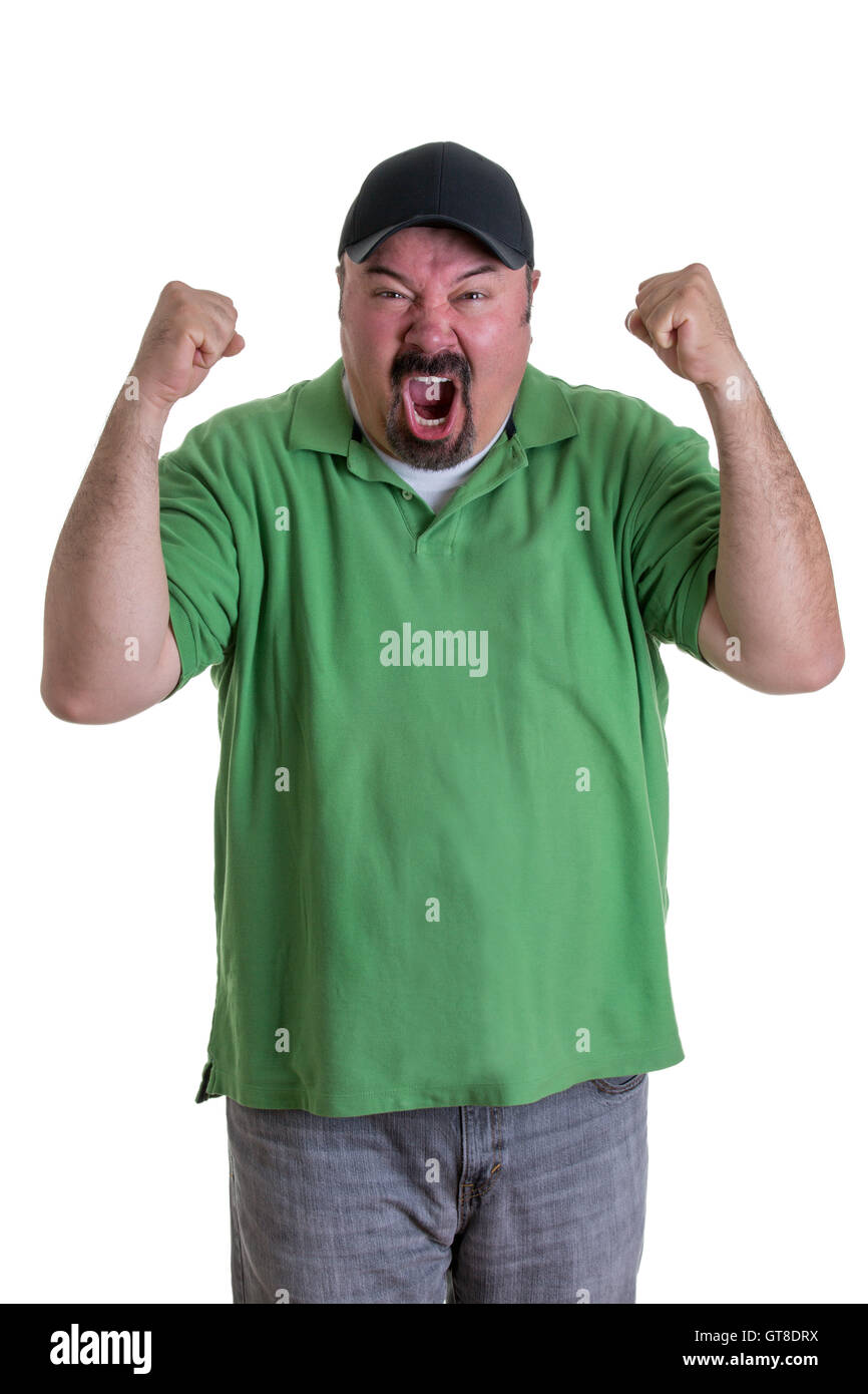 L'embonpoint Homme portant chemise verte et Noir Baseball Cap célébrant, pompage de poings en studio avec fond blanc Banque D'Images