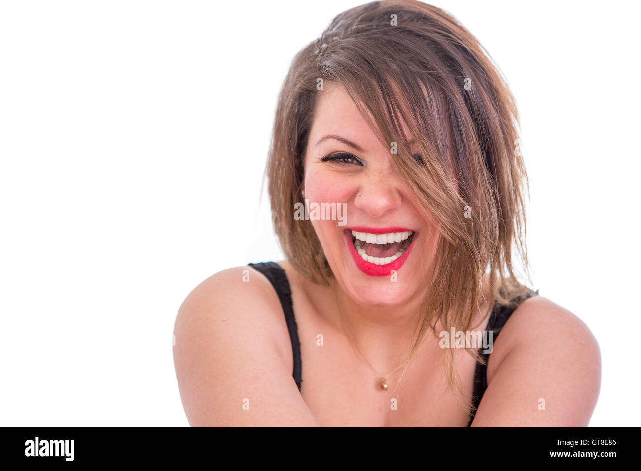 Close up Portrait of a Happy Blonde Woman Laughing at l'appareil photo, isolé sur fond blanc. Banque D'Images