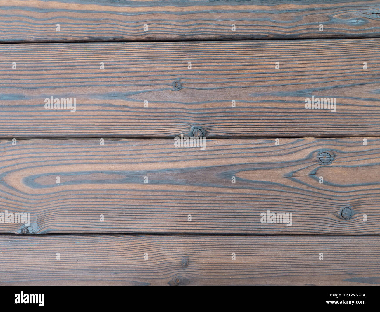 Planches en bois texturé brun foncé Banque D'Images