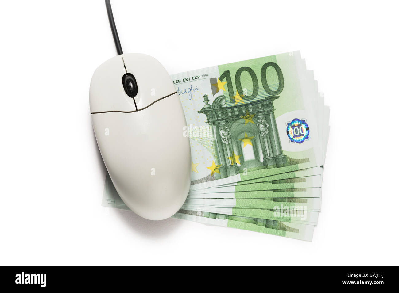 Souris d'ordinateur et d'une centaine de billets sur blanc Banque D'Images