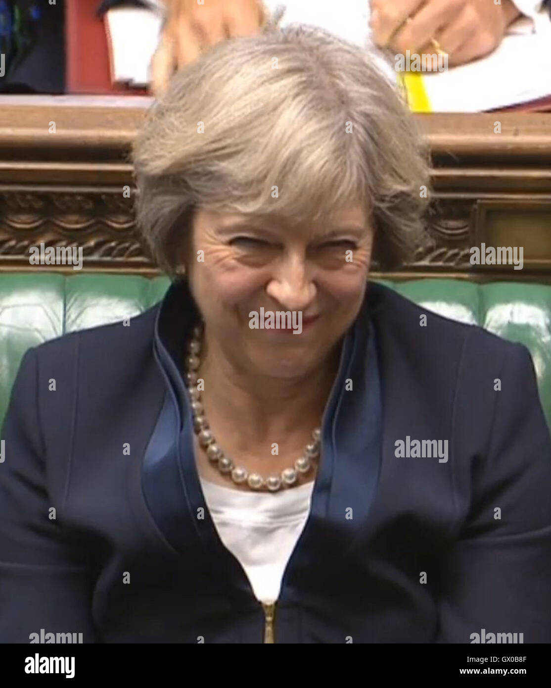 Premier ministre Theresa peut, au cours de questions au premier ministre à la Chambre des communes, Londres. Banque D'Images