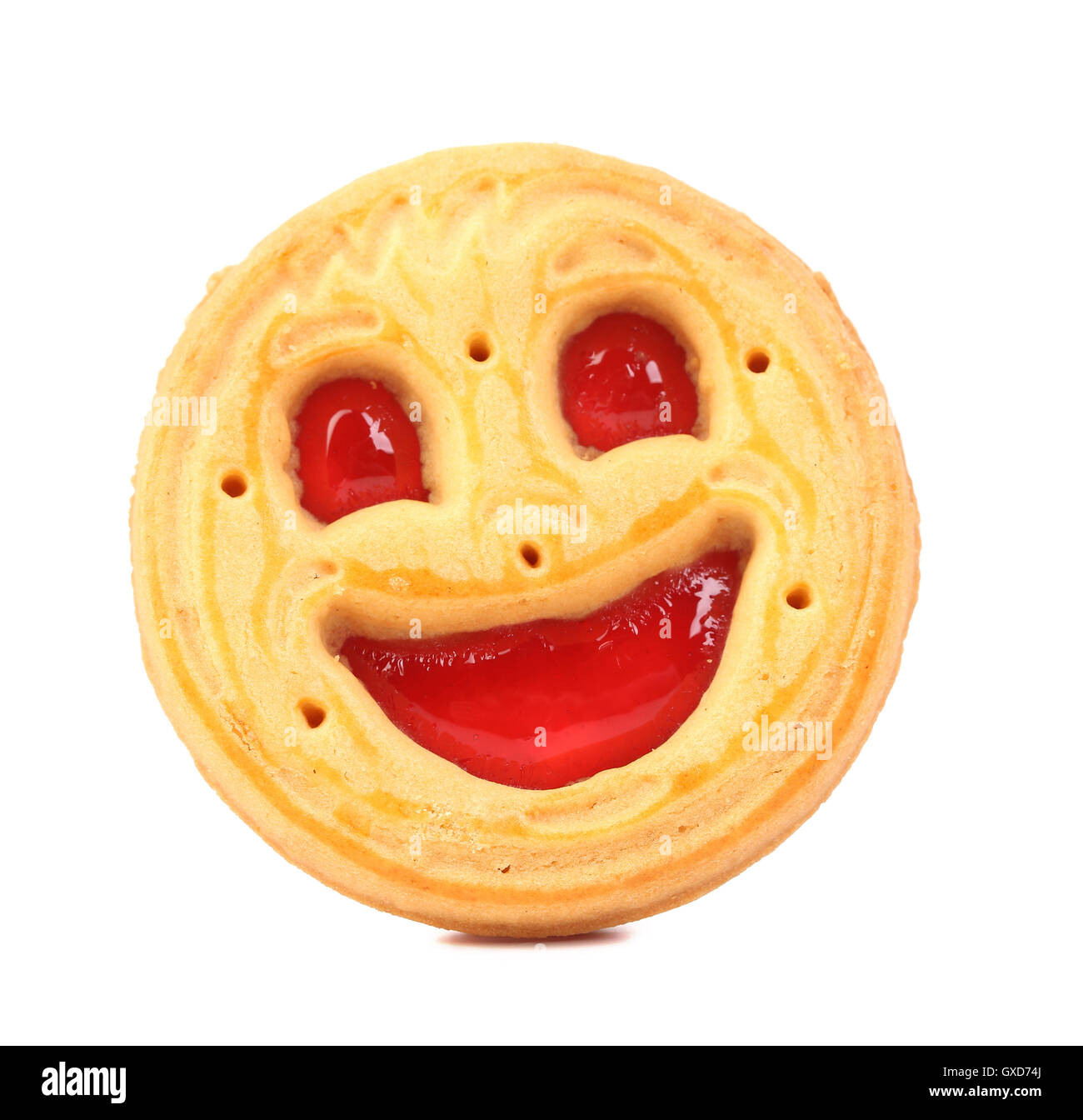 Biscuits Sourire avec de la gelée rouge. Banque D'Images