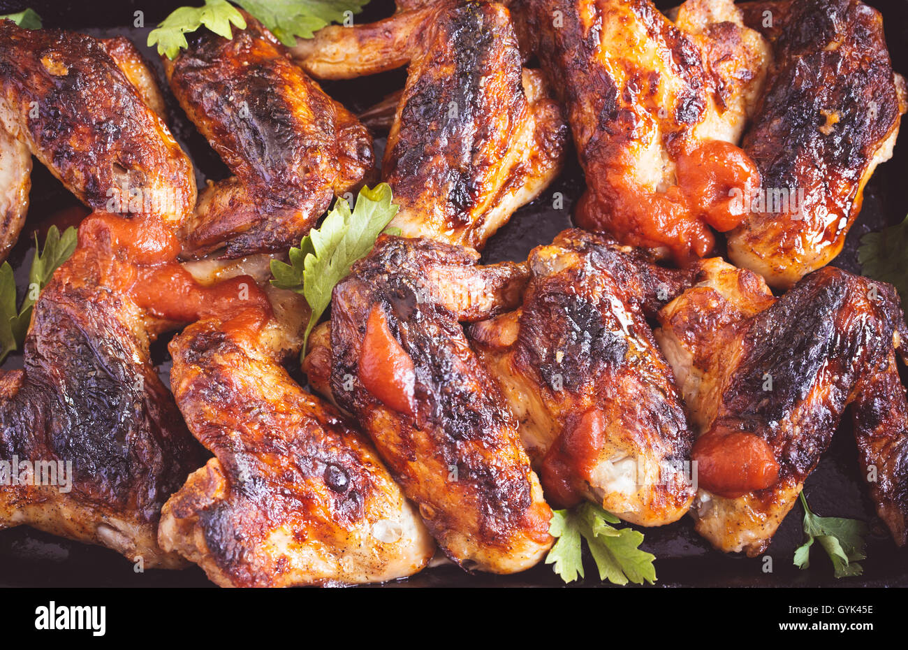 Ailes de poulet épicées closeup Banque D'Images