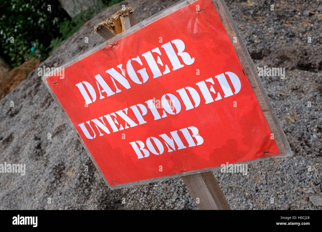 Bombe non explosée rouge danger sign Banque D'Images