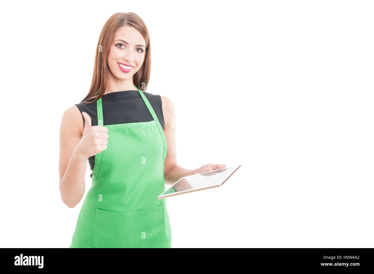 Happy female vendeur avec tablet showing thumbup ou comme geste isolé sur blanc avec copyspace Banque D'Images