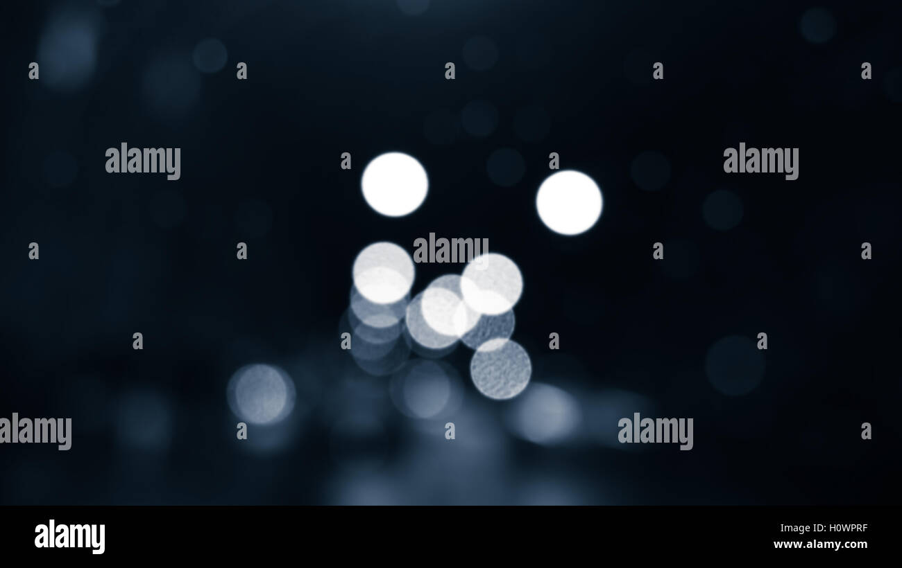 Bokeh coloré Lumières floues, effet d'optique. Contexte Résumé photo dans les tons bleus Banque D'Images