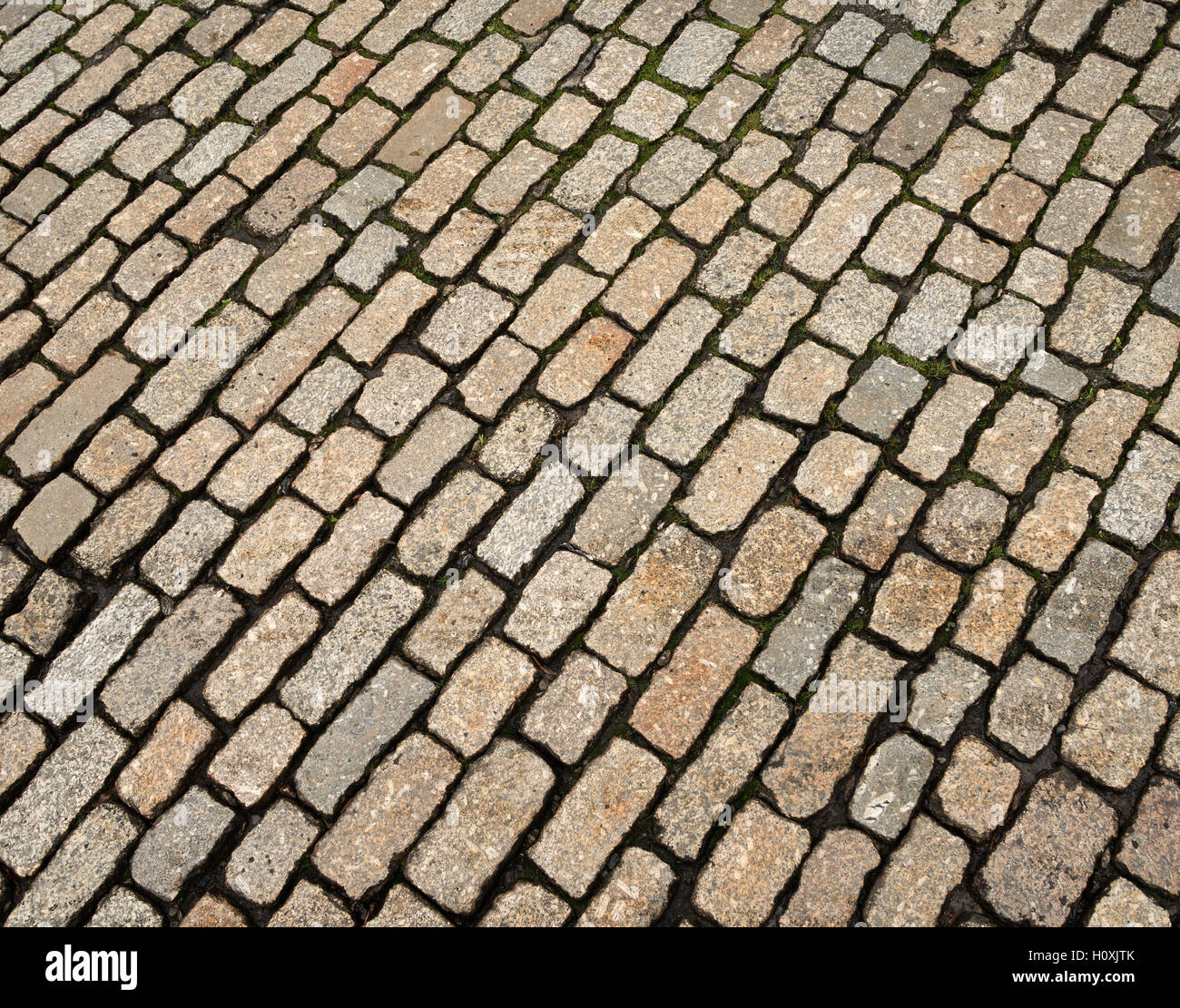 Old English cobblestone road brown couleur close up detail. Banque D'Images