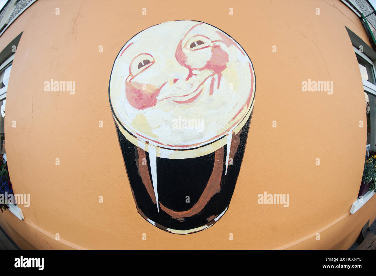 Il n'y a rien comme une Guinness. Gardez le sourire. Banque D'Images
