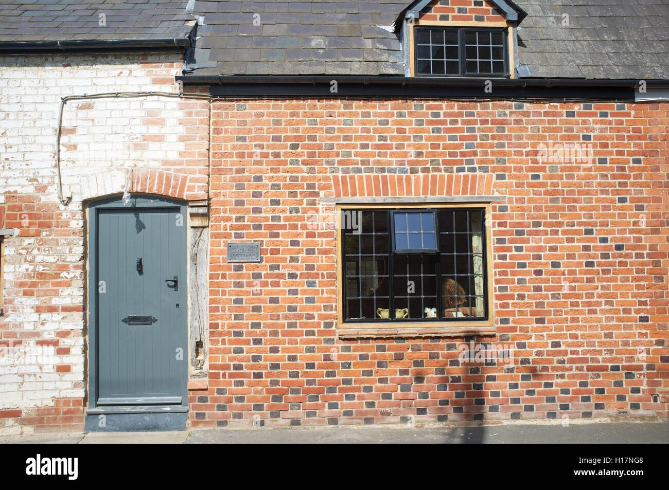 Maçonnerie rénovation sur ancien cottage Banque D'Images