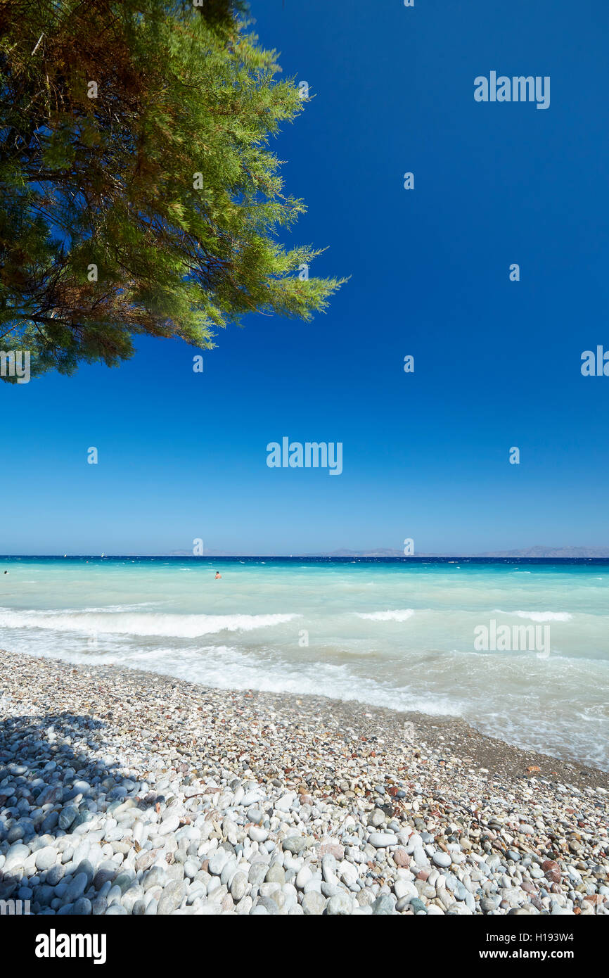 Scène de plage Rhodes Grèce Banque D'Images